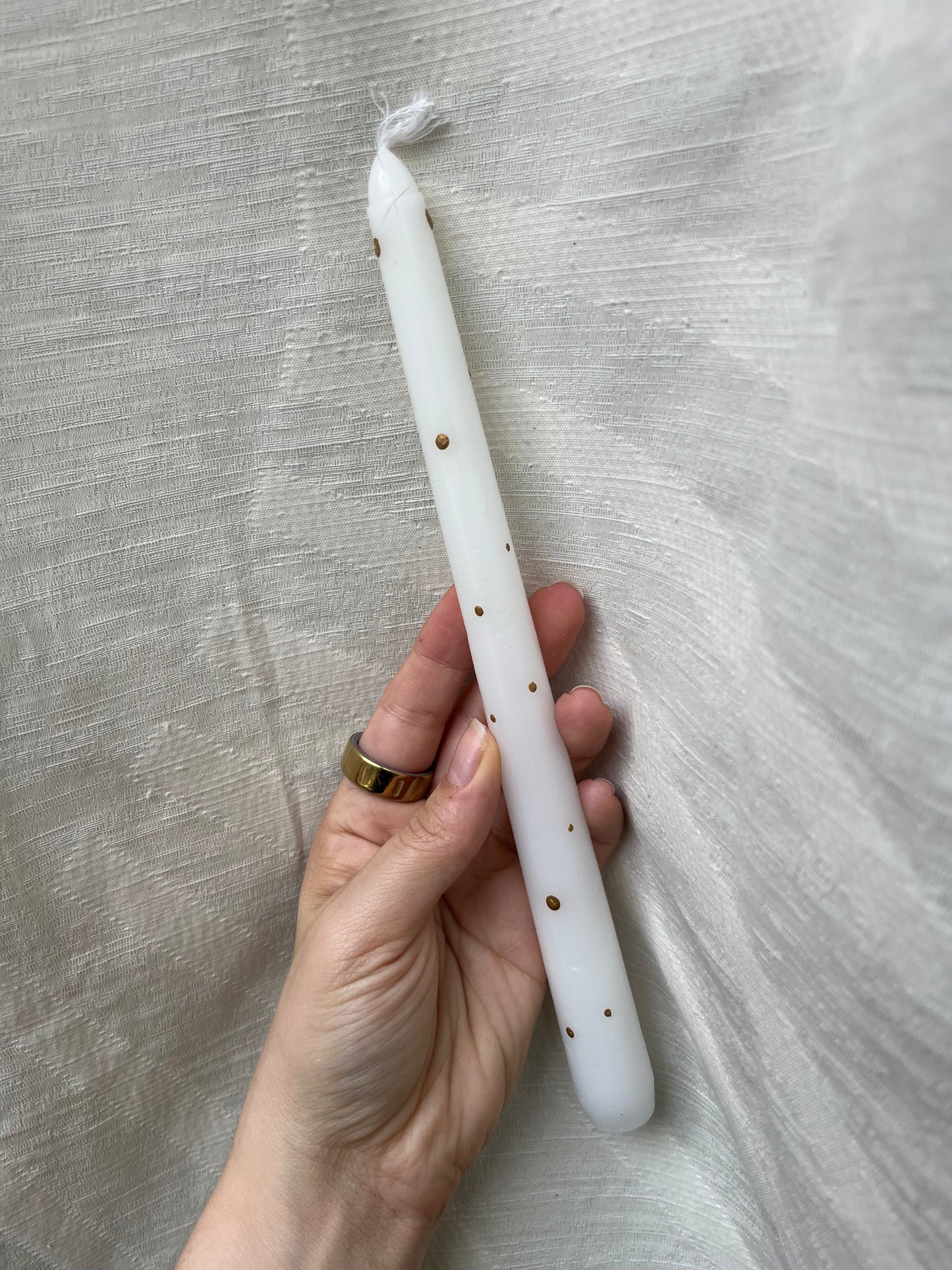 gold dot taper candle