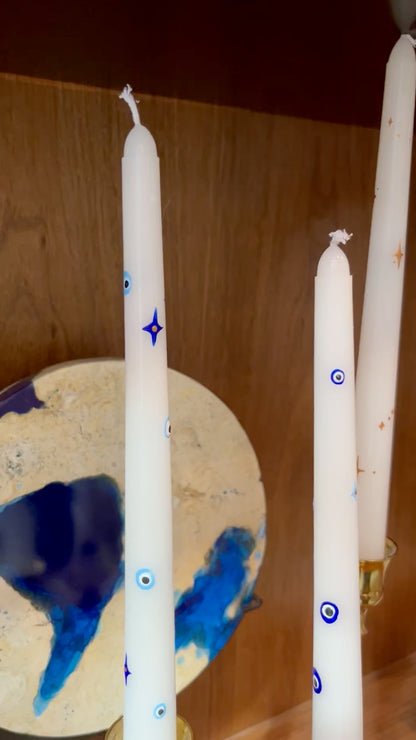 light blue evil eye taper candles